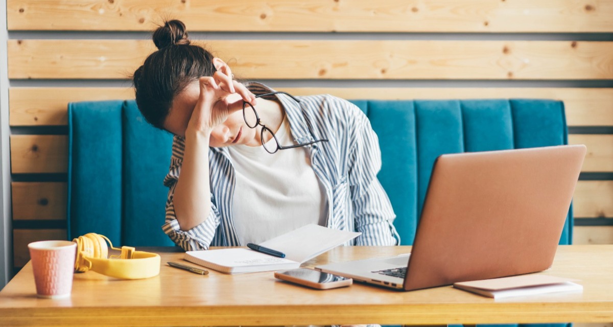 Here S Why Apartment Facebook Ads Could Get Pricy In 2024 RentVision   Tired Young Woman Sitting Near Her Laptop At The C 2021 09 03 13 46 44 Utc 1 1 